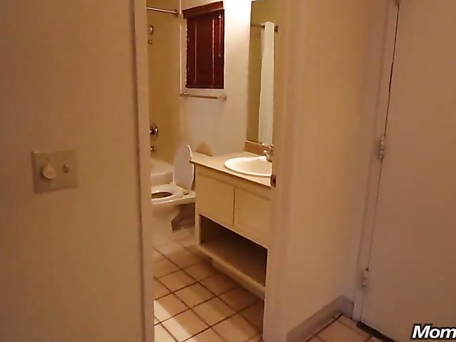 Bikini-clad black MILF Leyona fucks a white one