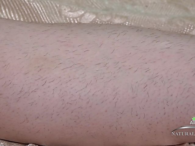 Big breasted Marceline Moore gently fingers her hairy bush 