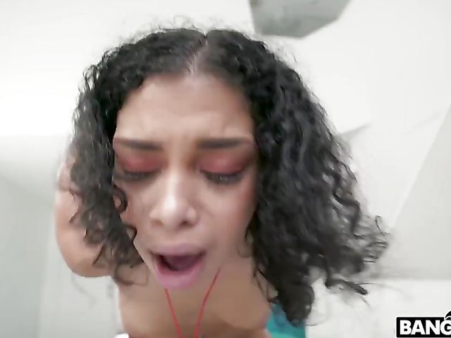 Curly haired petite brunette Jeni Angel gets a cock in her pussy