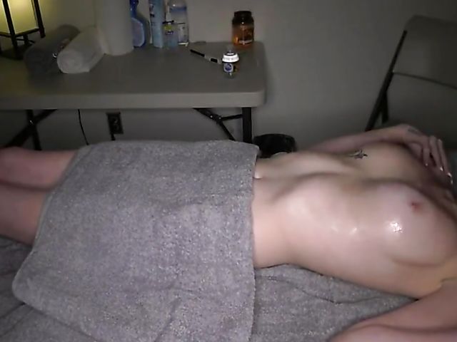 Lesbian amateur massage and orgasmic fingering with a perfect bodied oiled babe