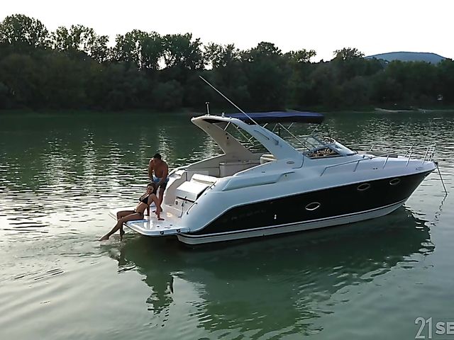 Feet licking and passionate fucking on the boat with bikini babe Tina Kay