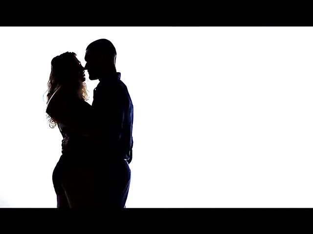 Sex Art lovers banging in bed featuring Emylia Argan