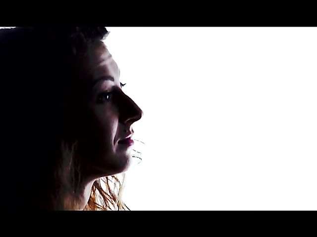 Sex Art lovers banging in bed featuring Emylia Argan