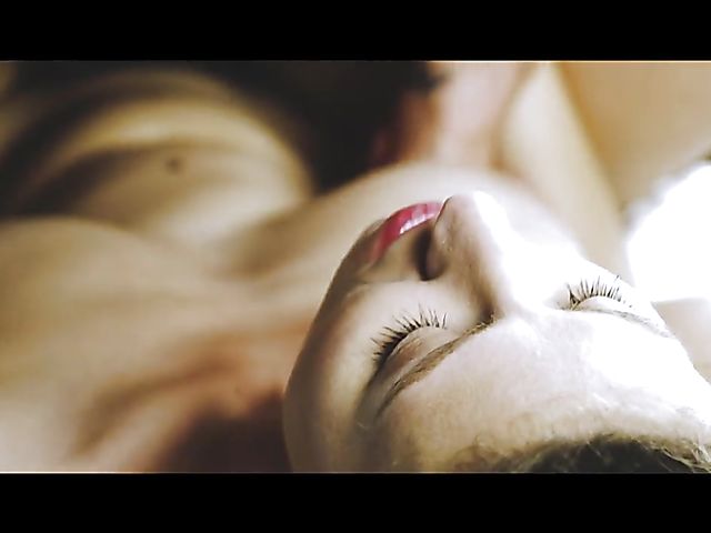 Sex Art lovers banging in bed featuring Emylia Argan