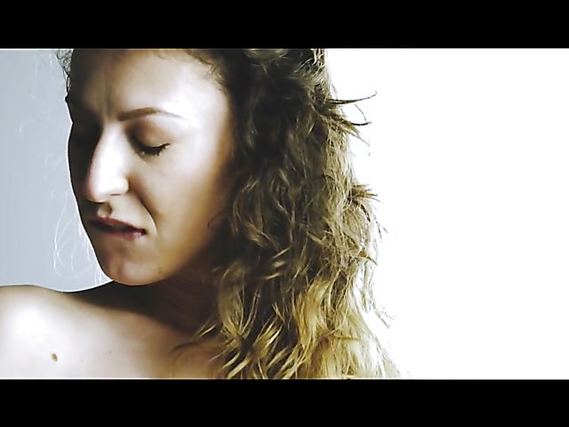 Sex Art lovers banging in bed featuring Emylia Argan