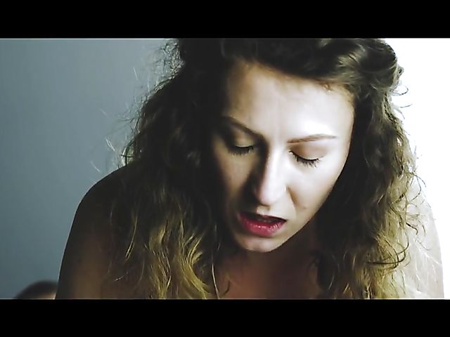 Sex Art lovers banging in bed featuring Emylia Argan