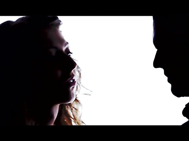 Sex Art lovers banging in bed featuring Emylia Argan