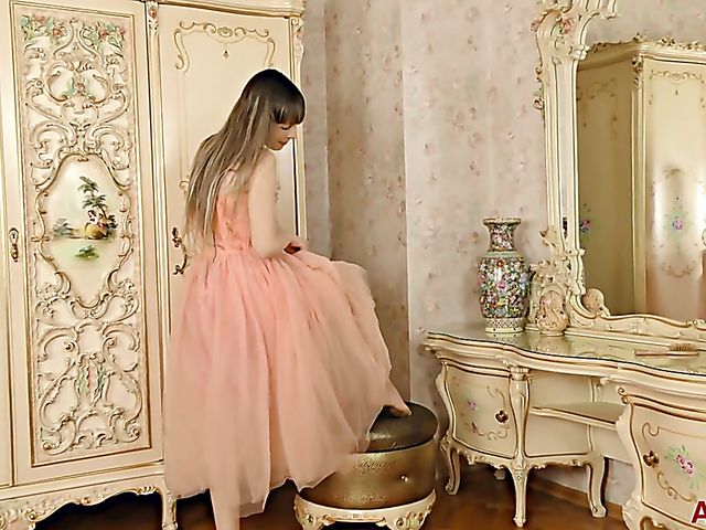 30-year-old cute MILF Preferita takes off her long dress and rubs her pussy