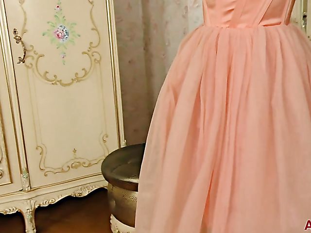 30-year-old cute MILF Preferita takes off her long dress and rubs her pussy