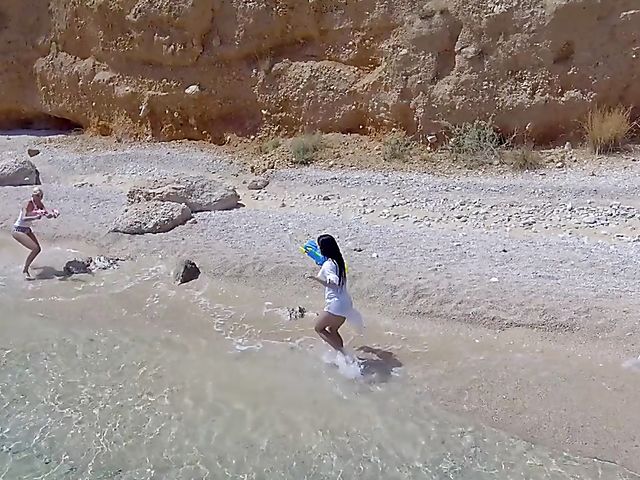 Lesbian beach babes Inna Innaki and Kitana Lure get all wet