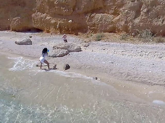 Lesbian beach babes Inna Innaki and Kitana Lure get all wet