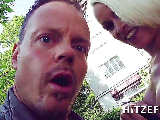 German MILF Sophie Logan flashes her tits and slit in the street before she gets fucked