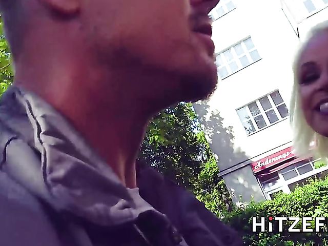 German MILF Sophie Logan flashes her tits and slit in the street before she gets fucked