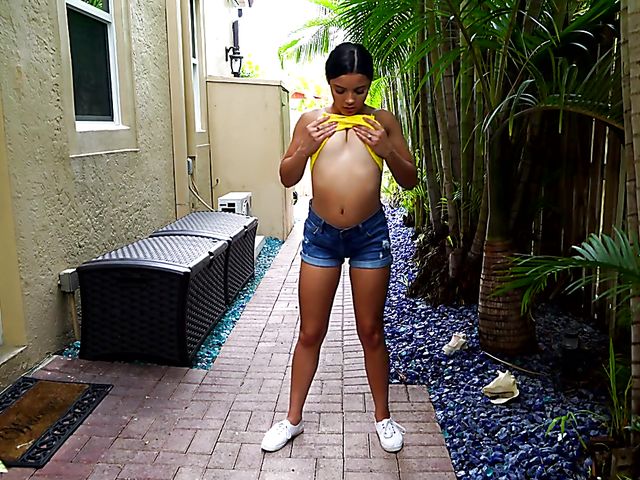 Solo latina Ella Cruz stripping and playing with her teen snatch outside