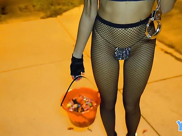 Petite asian teen Vina Sky in fishnets and police uniform flashes her goods in the street and fucks on Halloween