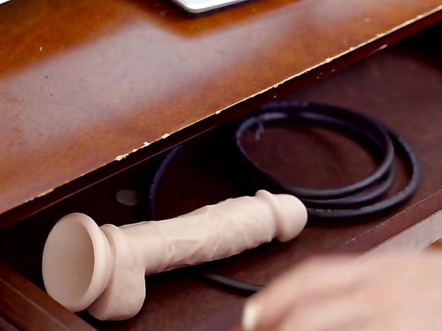 Redhead MILF Jennifer White stops playing with her dildo to fuck a real cock