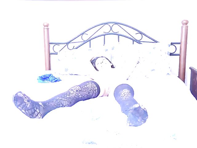 Tiny Vina Sky's asian pussy spread wide in bed for the camera