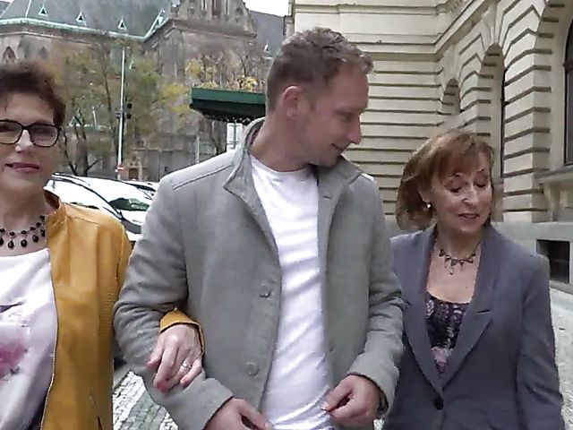 Two mature ladies and a boy have a threesome