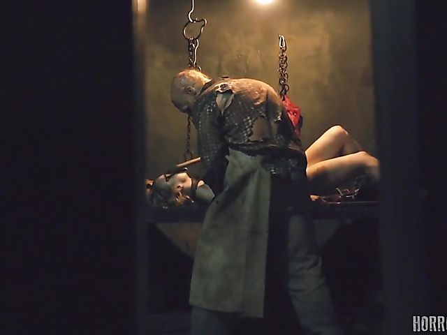 Masked butcher fucks his shaved and hairy sex slaves