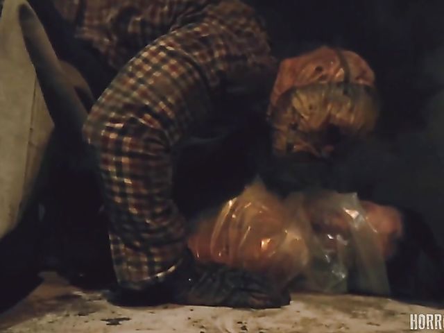 Masked butcher fucks his shaved and hairy sex slaves