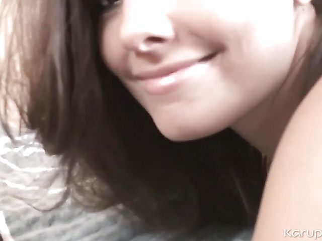 Smooth babe Aneta A loves posing nude on her bed for you