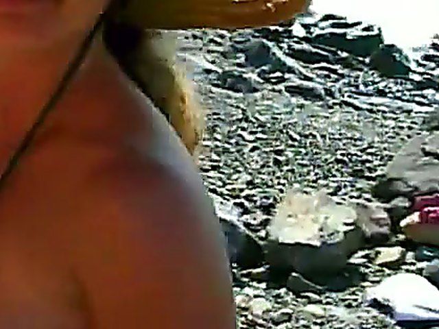 Beautiful chick fucks a stranger on the beach