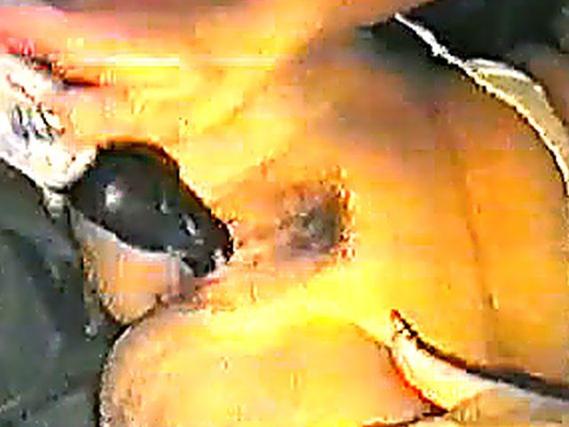 Mature lady with huge tits masturbates with toys