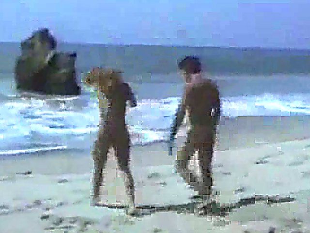 Hot passionate couple make love on the beach