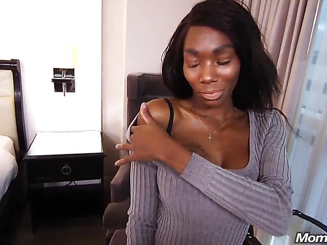 POV black MILF with fake titties takes a white sausage