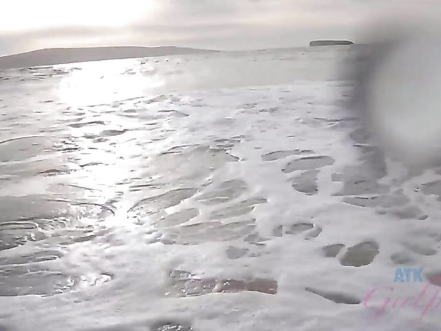 Aften Opal spreads her pussy in the car on the way to the beach to go skinny dipping