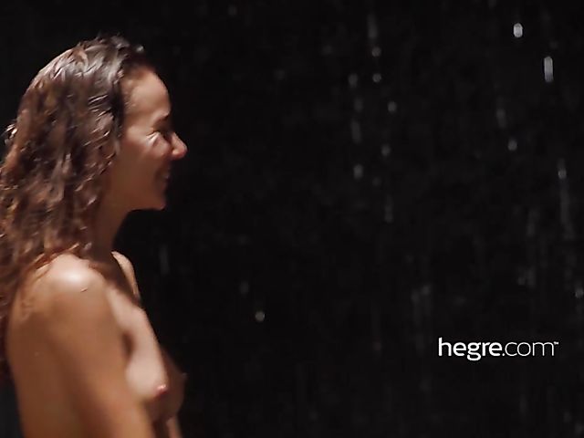 Nude girls Clover and Putri get wet under the waterfall in Bali