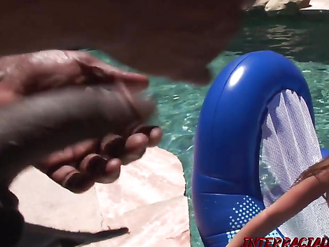 August sucking BBC in the pool and getting railed