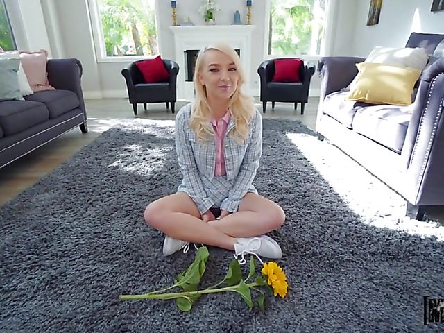 Blonde petite cutie with a flower Carmen Callaway begs for sex