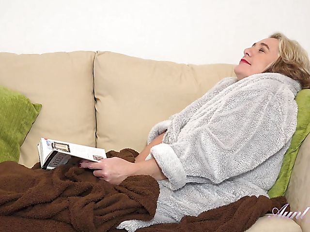 Mature masturbation with big breasted Camilla fingering her fat pussy on the couch