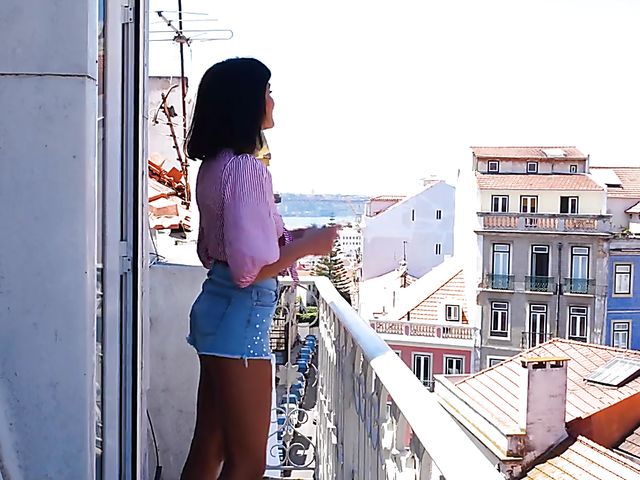 Exotic beauty Angel Constance balcony solo strip and posing