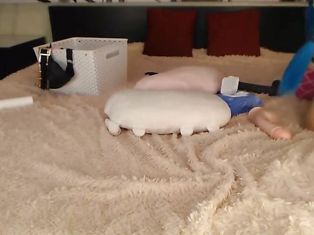 Blue hair webcam girl loves her black dildo and pink vibrator