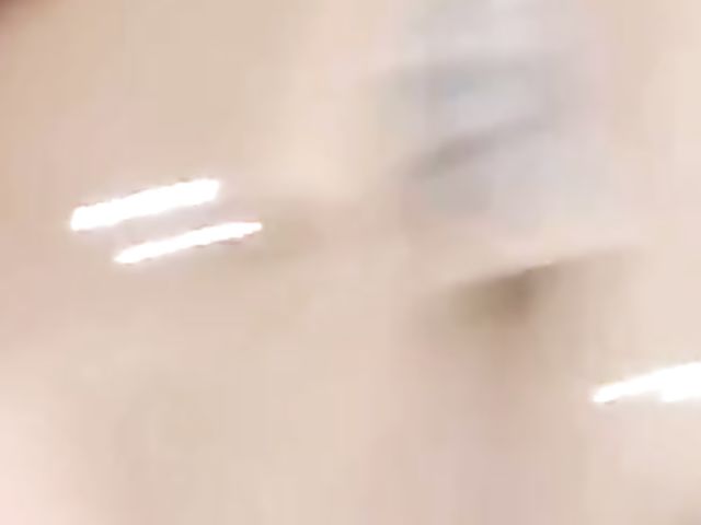 Shaved Japanese amateur rides her dildo in the bathroom