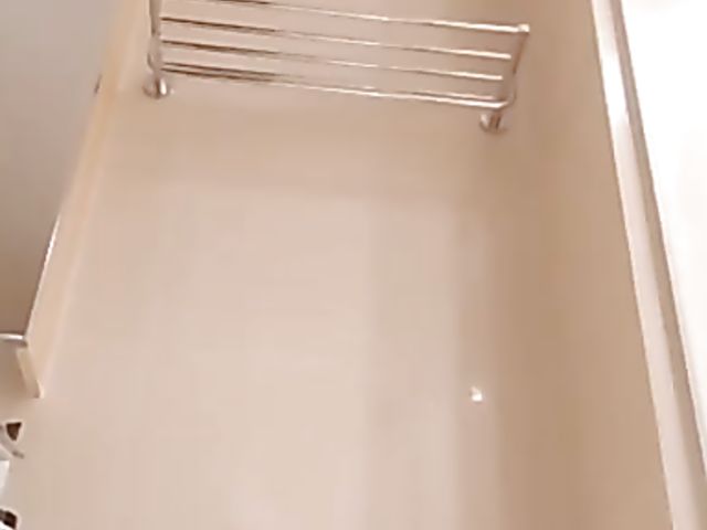 Shaved Japanese amateur rides her dildo in the bathroom