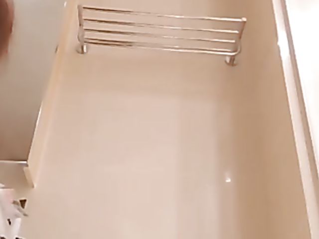 Shaved Japanese amateur rides her dildo in the bathroom