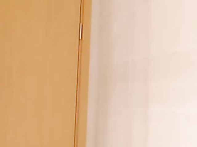 Shaved Japanese amateur rides her dildo in the bathroom