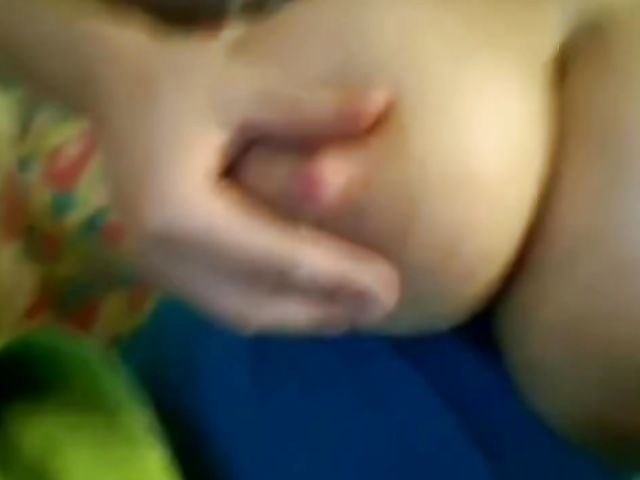 Busty amateur and her huge lactating tits