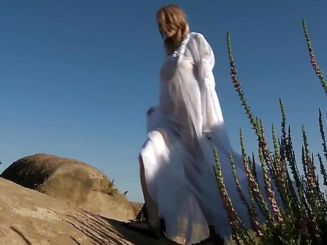 Bree Daniels solo outdoor fun with a magic mountain flower