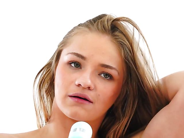 Solo teen Scarlett Fall gets naked and vibrates her pussy with a wand