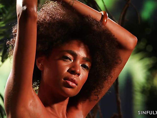 Erotic ebony solo with curly Luna Corazon in the dark