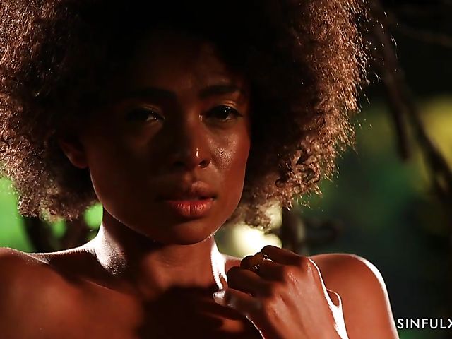 Erotic ebony solo with curly Luna Corazon in the dark