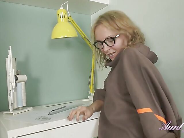 Curly slim MILF with glasses Irena rubs her shaved cunt softly