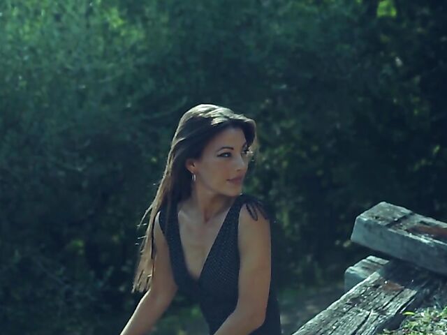 Slender babe with sexy legs Lorena B fingering in high heels