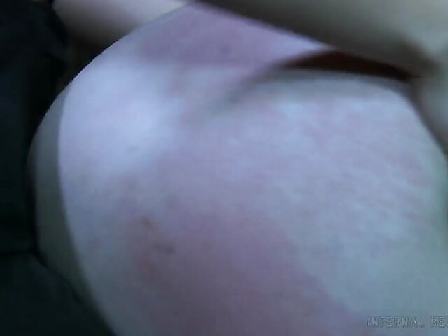 Strap-on from behind and caning punishment for helpless Claire Adams with heavily pierced pussy lips