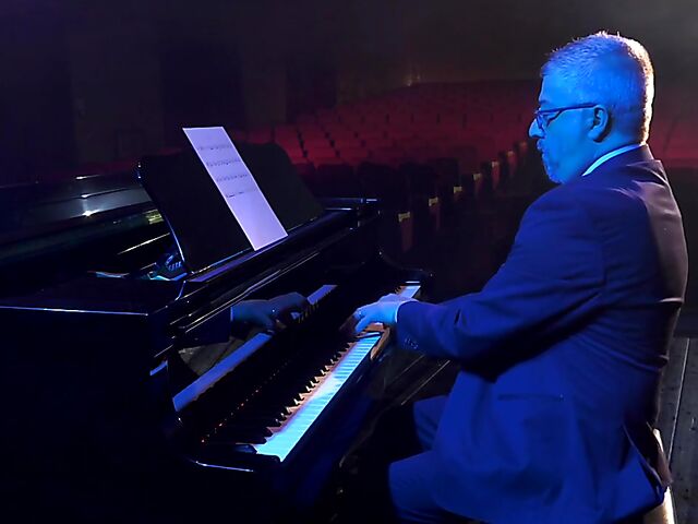 Italian porn by Mario Salieri features a natural busty burlesque queen seducing a guy to music