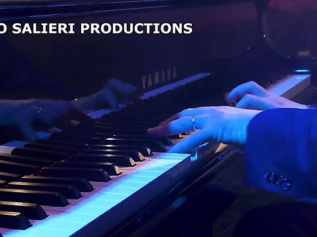 Italian porn by Mario Salieri features a natural busty burlesque queen seducing a guy to music